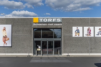 Schoenen Torfs bouw aannemer Eribo Waregem vastgoed