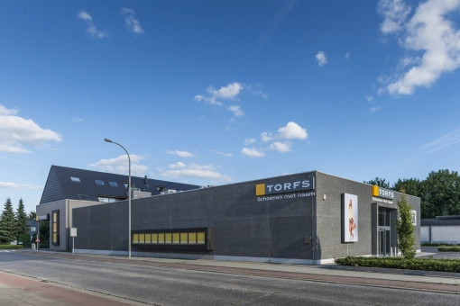 Schoenen Torfs bouw aannemer Eribo Waregem vastgoed